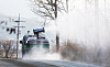 A vehicle sprays disinfectant in Anseong, Gyeonggi, on Dec. 17 to prevent the spread of avian influenza. [YONHAP]