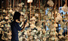 A visitor walks past 'Love Song in the Forest' by Yoo Joung-hye at the 13th edition of the Cheongju Craft Biennale on Aug. 29. [YONHAP]
