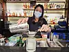 Nida Wongphanlert, general manager of the hotel, tries making a cocktail at the Jack Bain's Bar. [YIM SEUNG-HYE]