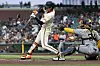 San Francisco Giants outfielder Lee Jung-hoo, left, singles in front of Milwaukee Brewers catcher William Contreras during the first inning of an MLB game in San Francisco on April 23. [AP/YONHAP]
