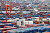 Trade containers are stacked at a Busan port on June 11. [NEWS1]