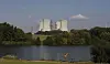 A man fishes with the towering Dukovany nuclear power plant in the background, in Dukovany, Czech Republic, Sept. 27, 2011. [AP/YONHAP]