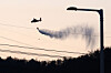 A firefighting helicopter drops water over a wildfire in Gyeongju, North Gyeongsang on Feb. 8. [YONHAP]