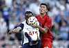 Tottenham Hotspur's Destiny Udogie in action against Bayern Munich's Kim Min-jae at Tottenham Hotspur Stadium in London on Saturday. [REUTERS/YONHAP]