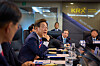 President Lee Jae-myung listens to a briefing on stock market trends and the market surveillance system during a visit to the Korea Exchange in Yeongdeungpo District, western Seoul, on June 11. [YONHAP]