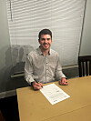 Zach Logue poses with a contract in a photo shared by the Doosan Bears on Thurday.  [DOOSAN BEARS]