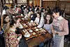 Kim Jung-hee, wife of Oh Kyeong-young, the sixth-generation descendant of the first owner of Ssangsanjae Hall, explains about the desserts to students on Dec. 2. [PARK SANG-MOON]