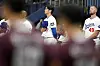 Los Angeles Dodgers' designated hitter Shohei Ohtani listens the national anthem prior to an exhibition game between the Dodgers and Kiwoom Heroes at Gocheok Sky Dome in western Seoul on Sunday. [AP/YONHAP]