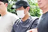 A man accused of killing a Chinese woman at an officetel parking lot in Yongin, Gyeonggi, on Aug. 21 is brought to the Yongin Seobu Police Station on Aug. 22 after being arrested at Hongcheon County, Gangwon, the same day. [YONHAP]
