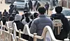 Test-takers exit an ETS testing center in Jongno District, central Seoul, on Feb. 5, 2023 [YONHAP]