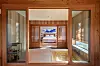 The exterior, top, and interior, above, of Yeongwol Jongtaek, which is a private hanok hotel. [JOONGANG ILBO]
