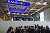 Reporters gather around Shlomo Toaff, of the Israeli Rafael Advanced Defense Systems, at the Paris Air Show, June 16, in Le Bourget, north of Paris. [AP/YONHAP]