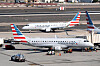 An American Airlines American Eagle jet taxis past another at Phoenix Sky Harbor International Airport in Phoenix, Arizona, on Nov. 8. [AP/YONHAP]