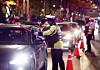Police officers stop drivers to carry out breathalyzer checks near Gongdeok Station in western Seoul on Nov. 21. [YONHAP]