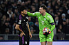 Bayern Munich goalkeeper Manuel Neuer, right, checks on Kim Min-jae during the UEFA Champions League last 16 first leg between Lazio and Bayern Munich at the Olympic stadium on Feb. 14 in Rome. [AFP/YONHAP]