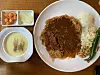 Namsan tonkatsu consists of a large pork cutlet, smothered in a sweet and sour demi-glace sauce. It is often served with shredded cabbage, macaroni salad, baked beans, rice, green chili pepper, corn soup, kimchi and kkakdugi (spicy fermented radish). [LEE JIAN]