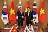 President Lee Jae Myung, right, and General Secretary To Lam of the Communist Party of Vietnam, left, shake hands during a summit at the presidential office in Yongsan, central Seoul on Aug. 11. [PRESIDENTIAL OFFICE]