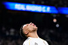 Real Madrid's Kylian Mbappe reacts after missing a chance to score during the Spanish La Liga soccer match between Real Madrid and Sevilla in Madrid on Dec. 20. [AP/YONHAP]