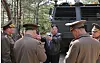 North Korean leader Kim Jong-un supervises a combined strike drill involving long-range artillery and missile systems on May 8. [YONHAP]