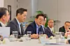 President Lee Jae Myung, third from left, speaks in a meeting with businesspeople accompanying him on his U.S. visit including Samsung Electronics Executive Chairman Lee Jae-yong, second from left, and LG Group Chairman Koo Kwang-mo, third from right, at the Yongsan presidential office in central Seoul on Aug. 19. [PRESIDENTIAL OFFICE]