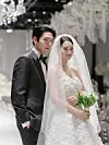 Actors Kim Woo-bin, left, and Shin Min-a tie the knot at the Shilla Hotel in Jung District, central Seoul, on Dec. 20. [AM ENTERTAINMENT]