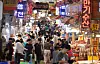 Shoppers buy goods at Bujeon Market in Busanjin District, Busan, on Sept. 24 ahead of the Chuseok holiday. [YONHAP]