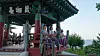 Visitors to Naksansa in Gangwon meditate while listening to ocean waves. [CULTURAL CORPS OF KOREAN BUDDHISM]