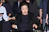 Han Hak-ja, the leader of the Unification Church, leaves the courtroom at the Seoul Central District Court on Sept. 22 after attending a pretrial detention hearing. [JOINT PRESS CORPS]