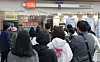 People line up in front of an SK Telecom retail store in Seoul on April 29 to replace their subscriber identity module (SIM) card free of charge. [YONHAP]