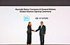 Hyundai Motor Group Executive Chair Euisun Chung, right, shakes hands with General Motors CEO Mary Barra after signing an agreement pledging cooperation in automobile development in New York in September 2024. [HYUNDAI MOTOR]