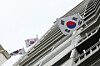 Taegeuki, Korean national flags, are hung on an apartment complex in Seoul on Aug. 15, Korea's Liberation Day. [YONHAP]