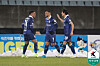 Denisson Silva of Chungnam Asan FC, center, celebrates with teammates Juninho Rocha, left, and An Yong-woo after scoring a goal against Daegu FC during the teams' K League promotion-relegation playoff match at Cheonan Stadium in Cheonan, South Chungcheong, on Nov. 28. [KOREA PROFESSIONAL FOOTBALL LEAGUE]