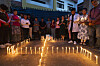 Family members of protest victims participate in a candle light vigil outside the morge of Teaching hospital in Kathmandu, Nepal on Sept. 11. [EPA/YONHAP]