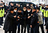 The assailant, who attacked Democratic Party leader Lee Jae-myung, taken to the Busan Metropolitan Police Agency for questioning on Tuesday. [YONHAP]