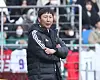 Kim Sang-sik watches a K League 1 match between Jeonbuk Hyundai Motors and Ulsan Hyundai, now called Ulsan HD, at Ulsan Munsu Football Stadium in Ulsan on Feb. 25, 2023. [YONHAP]