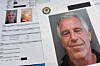 Documents that were included in the U.S. Department of Justice's release of the Jeffrey Epstein files are photographed on Jan. 2. [AP/YONHAP]