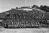 Gunners from the 16th New Zealand Field Regiment pose for a photograph in front of Kiwi Hill at the regiment's headquarters in Korea in 1953. The photo has been provided by Sue Corkill, author of 'Korea: A Kiwi Gunner's Story,' published by Fern Publishing in 2014. [SUE CORKILL]