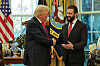 In this photo released by Syrian Presidency press office, U.S. President Donald Trump, left, shakes hands with Syria's President Ahmad al-Sharaa, at the White House in Washington on Nov. 10. [AP/YONHAP]