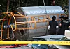 Police forensic investigators examine the scene where workers collapsed and lost consciousness while cleaning a temporary tank at a ready-mix concrete plant in Suncheon, South Jeolla, on Aug. 21. [YONHAP]