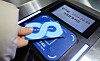 A commuter taps in with the Climate Card, the capital's unlimited transit pass, to enter a subway station in downtown Seoul on Jan. 28. [NEWS1]