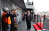 This photo, carried by North Korea's official Korean Central News Agency on Oct. 6, shows North Korean leader Kim Jong-un, right, visiting the 5,000-ton destroyer, named the Choe Hyon, on Oct. 5. [KCNA]