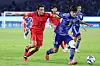 Korea's Song Min-kyu, left, vies for the ball during the final of the men's football tournament at the Hangzhou Asian Games in Hangzhou, China on Oct. 8, 2023. [NEWS1]
