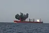 A screen grab taken from a handout video released by the Houthis military media center on July 8 shows the Liberian-flagged bulk carrier, the Magic Seas, sinks after being attacked in the Red Sea off the port city of Hodeidah, Yemen, July 6. [EPA/YONHAP]
