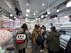Shoppers look at blankets at Gwangjang Market in Jongno District, central Seoul, on Dec. 22. [KWAK JOO-YOUNG]