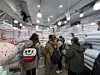Shoppers look at blankets at Gwangjang Market in Jongno District, central Seoul, on Dec. 22. [KWAK JOO-YOUNG]