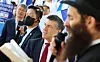 Israel's Ambassador to Kore Akiva Tor repeats the words of the rabbi, right, as he reads aloud from the book of Psalms during the rally in Seoul on Tuesday. [YONHAP]