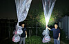 Members of the North Korean defectors group Fighters for a Free North Korea hold large balloons carrying anti-Pyongyang leaflets in northern Gyeonggi in June. [NEWS1]
