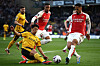 Wolverhampton Wanderers' Hwang Hee-chan, left, vies with Arsenal's William Saliba at the Molineux in Wolverhampton, England on Saturday. [AFP/YONHAP]