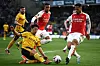 Wolverhampton Wanderers' Hwang Hee-chan, left, vies with Arsenal's William Saliba at the Molineux in Wolverhampton, England on Saturday. [AFP/YONHAP]