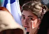An Israeli participant of the rally in Seoul on Tuesday wipes her tears as she listens to a performance of 'I have no other country.' [YONHAP]